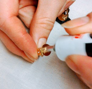 Affixing clip to earring