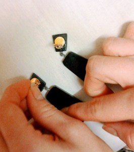 Affixing clip to earring back-1